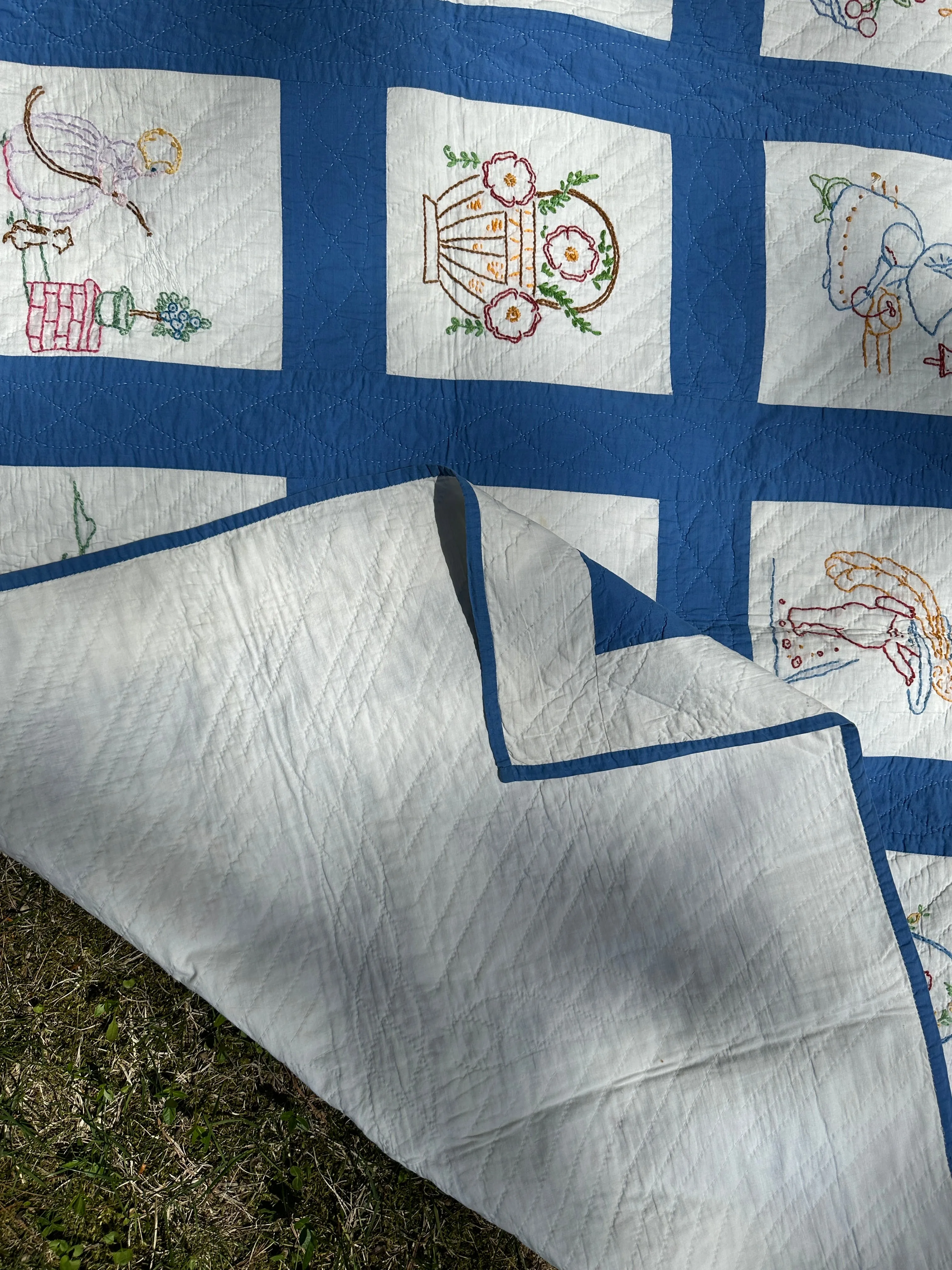 Vintage Embroidered Blue and White Quilt